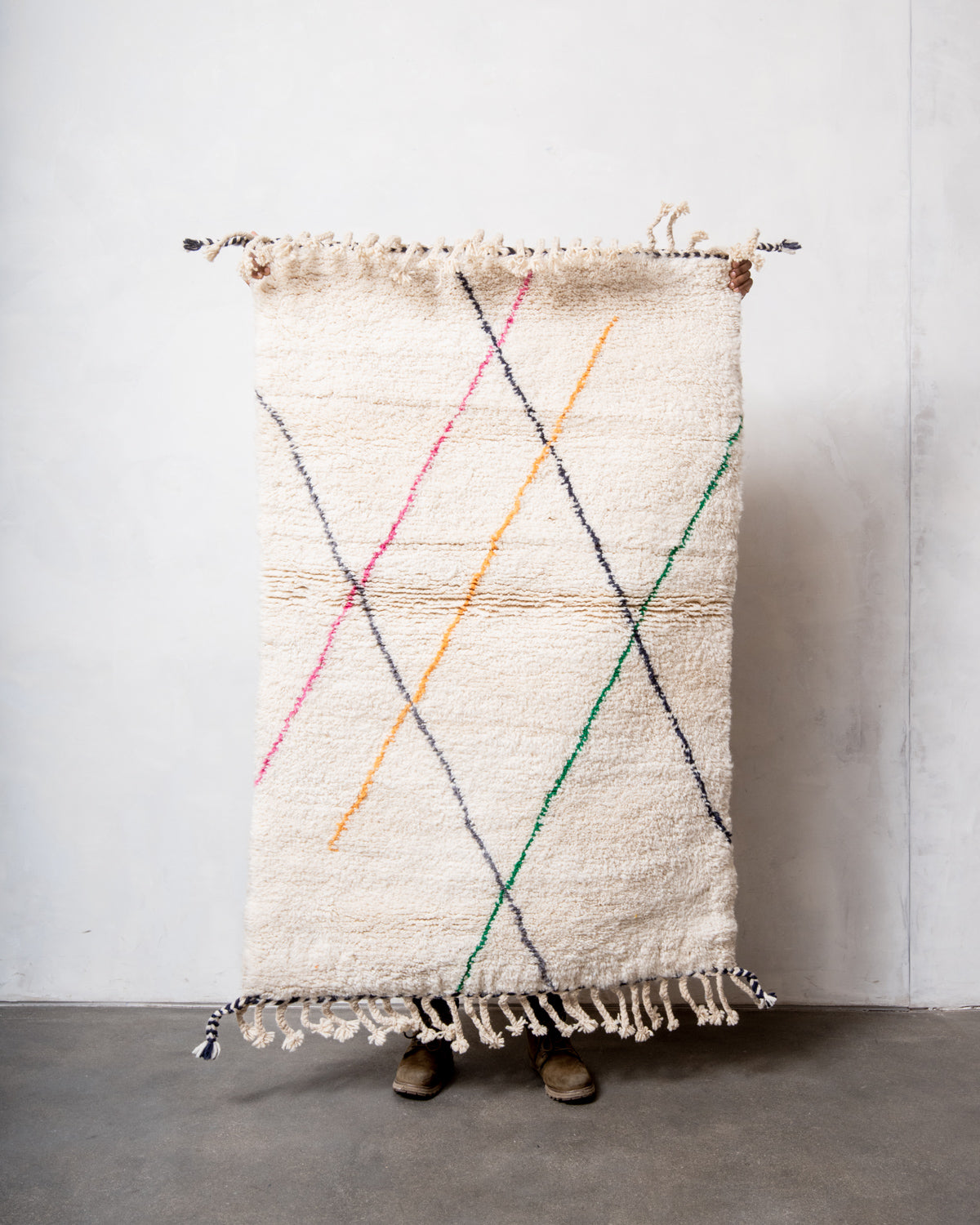 Modern, designer, handcrafted Berber rug from Morocco. Beniourain carpet with beautiful colours and patterns and fluffy wool texture.